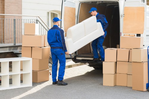 Local office removals vehicle loading business furniture for West Ealing relocation