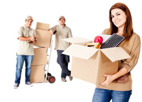Packed boxes and furniture prepared for a local move in West Ealing