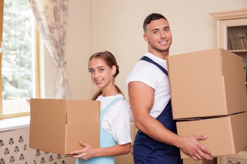 Unpacking boxes in a West Ealing flat after a local move