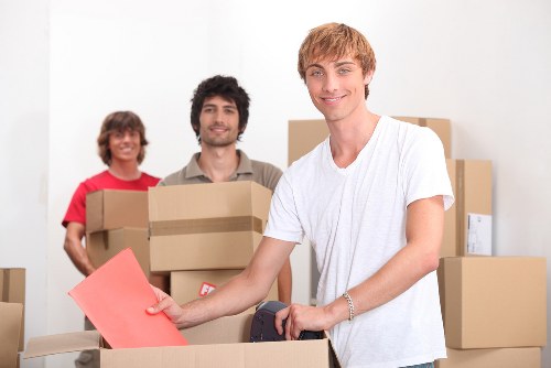Packed boxes and furniture ready for collection