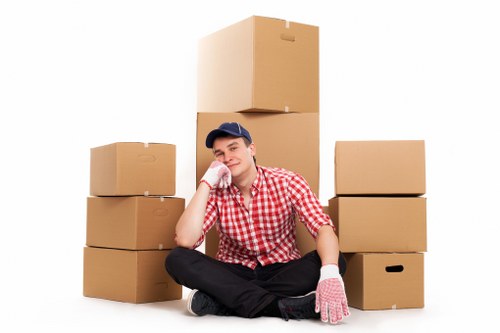 Local moving team loading boxes for a West Ealing relocation